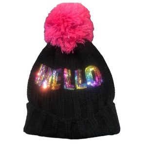 ⭐️ Claire’s beanie.  Black with pink pompom.